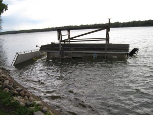 Dock, Lift and pontoon were flipped over by 74 mph wind gust.